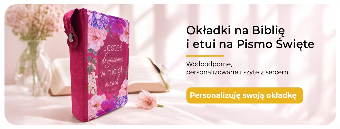 Niebieska okładka na Biblię i etui na Pismo Święte obok otwartej Biblii.