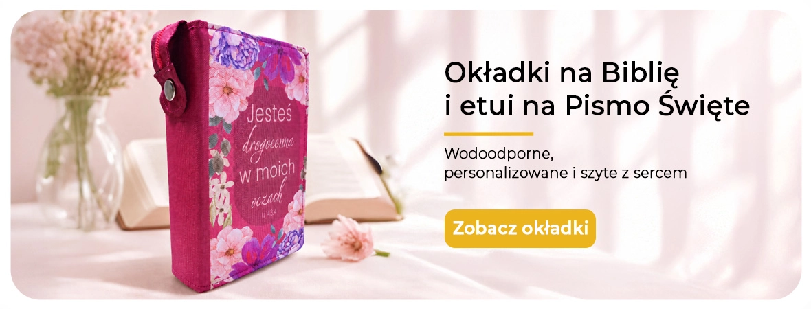 Niebieska okładka na Biblię i etui na Pismo Święte obok otwartej Biblii.